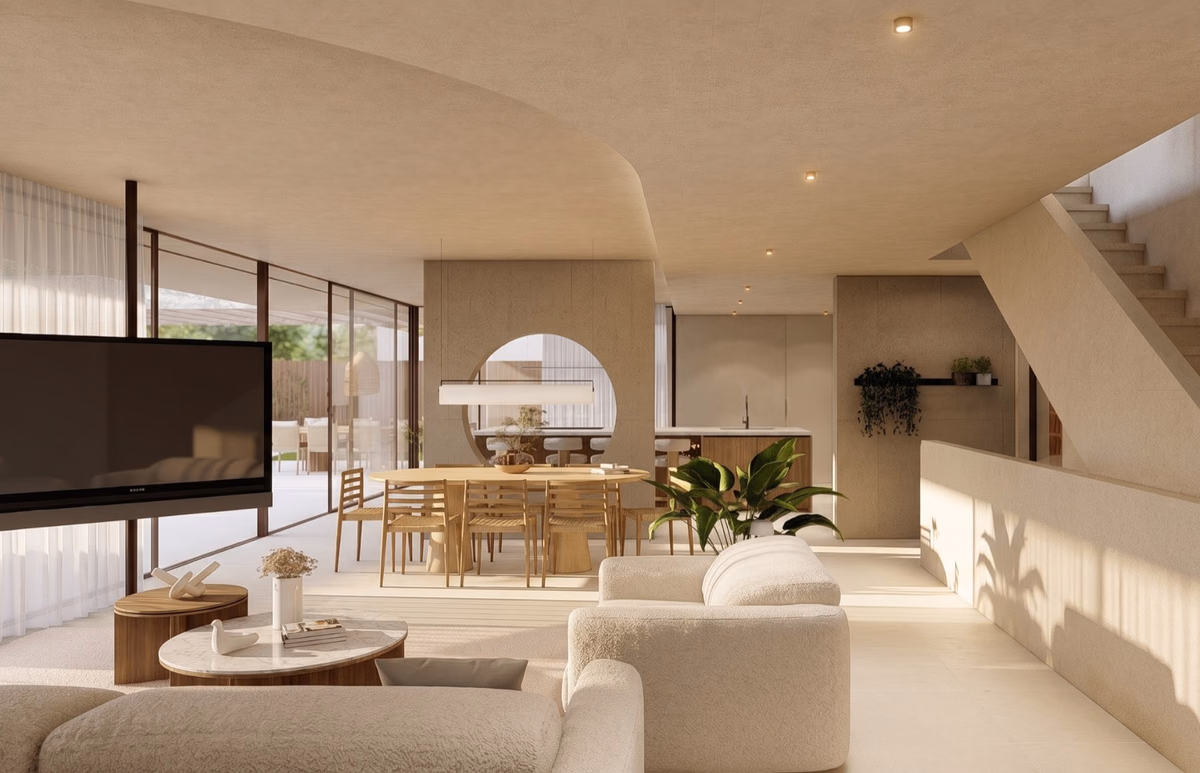 Salón y comedor de la vivienda Albert Fernández, con techo abovedado y carpintería de madera.