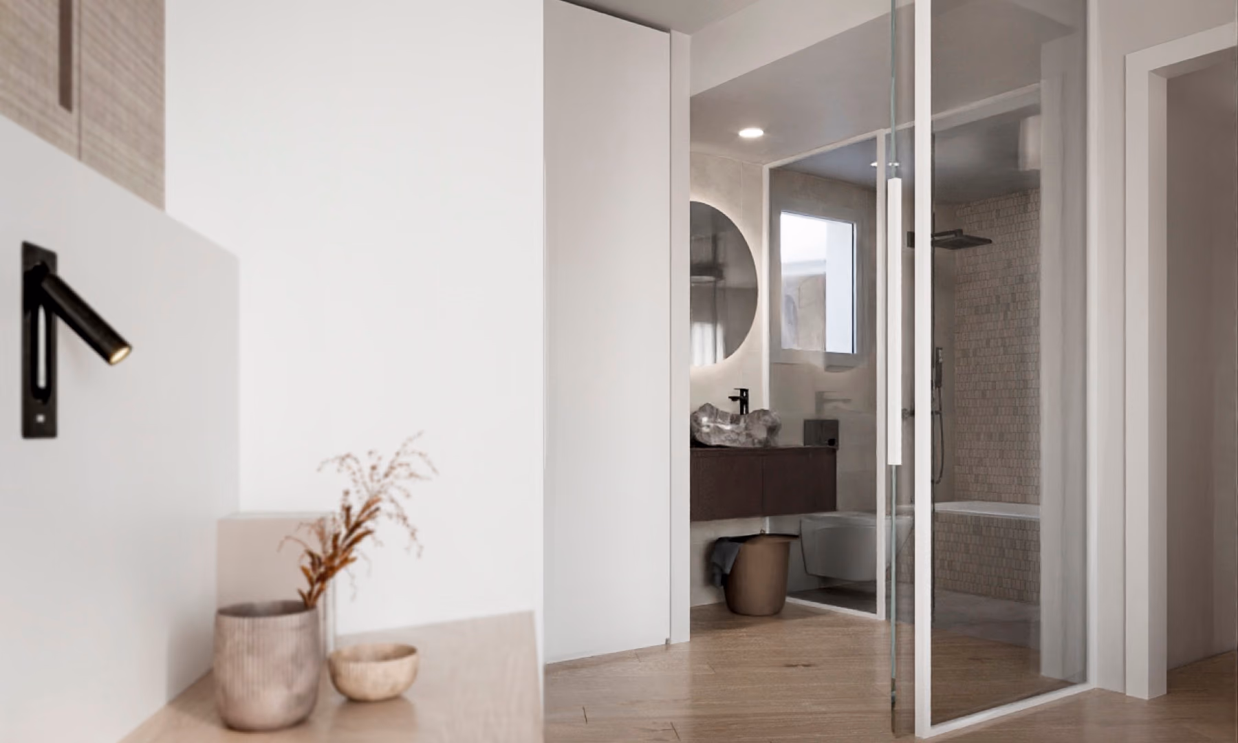 Vestidor de la suite principal, con carpintería a medida en madera y luz indirecta.