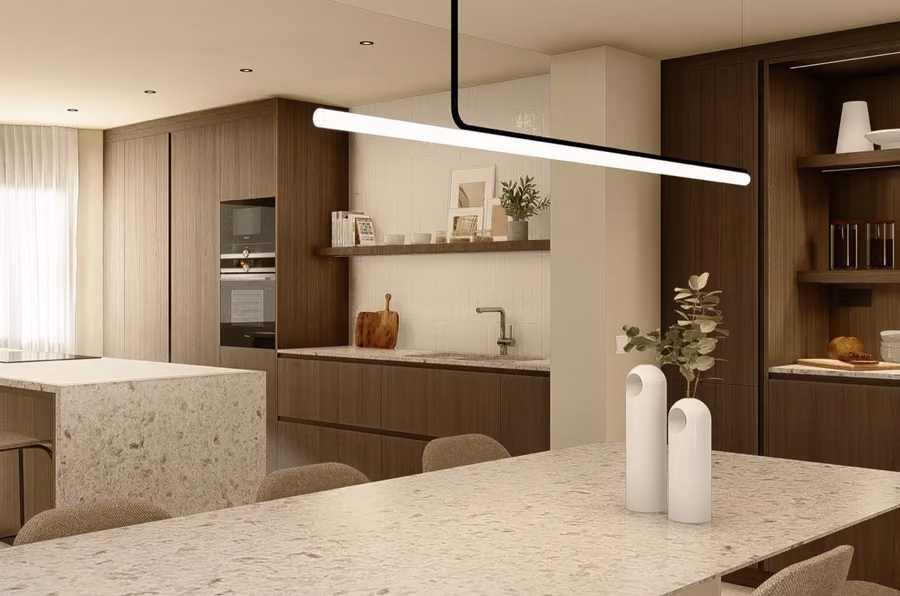Cocina en madera de diseño Mobalco en un piso reformado en Cambrils, con iluminación Marset.