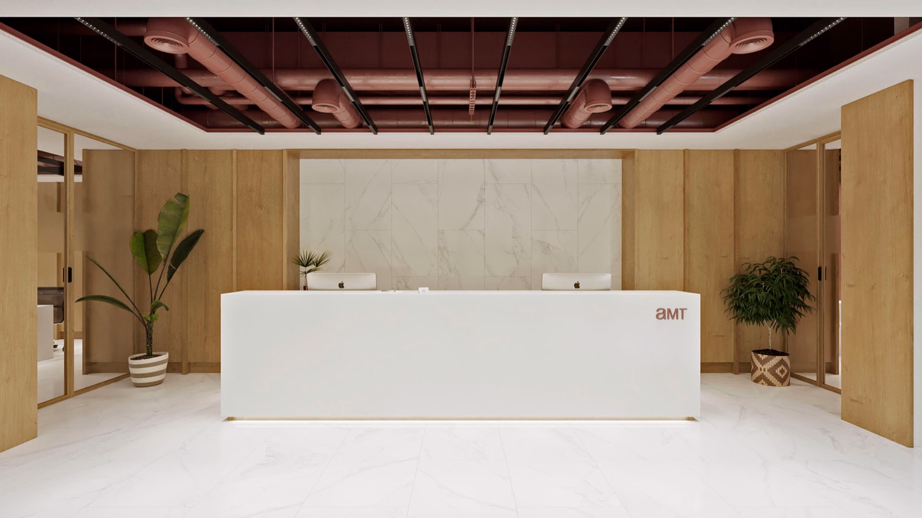 Oficinas AMT: espacio de trabajo diáfano con áreas de reunión integradas.