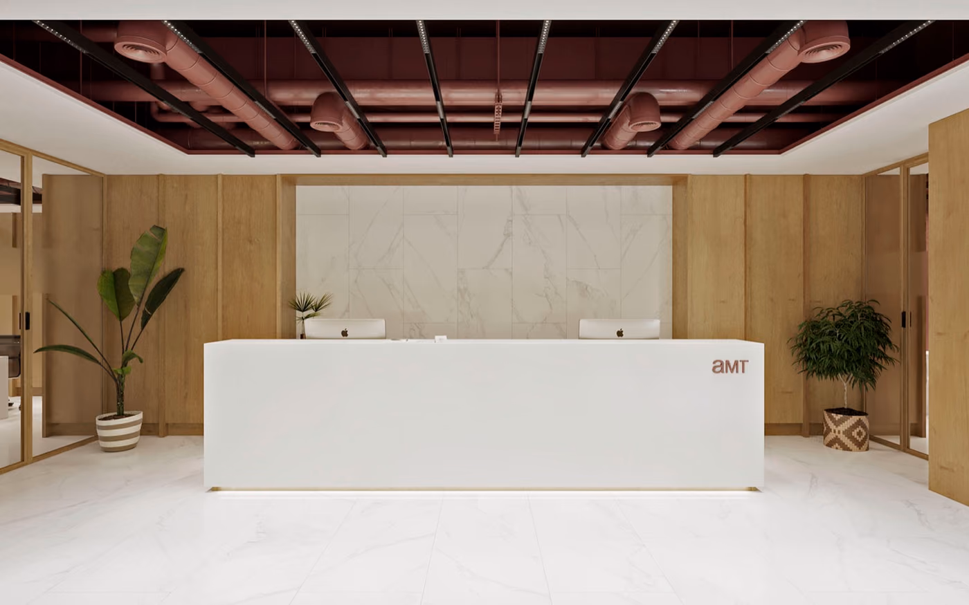 Oficinas AMT: espacio de trabajo diáfano con áreas de reunión integradas.